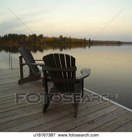 Two Adirondack Chairs on Dock View Large Photo Image Stock Photo - Two Adirondack Chairs on Dock. Fotosearch