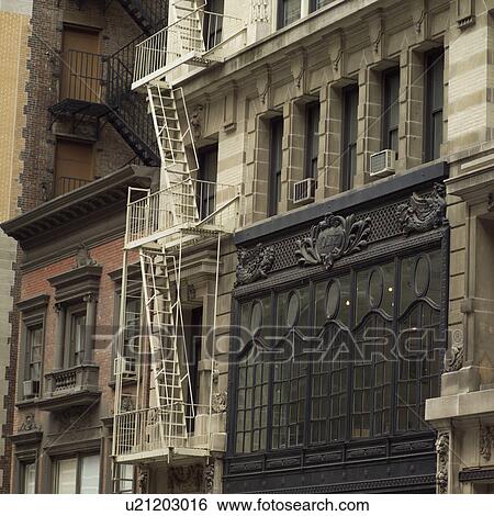 Stock Photograph - Fire escape on exterior of building, New York City. Fotosearch