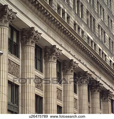 Carved stone pillars of a building View Large Photo Image Stock Photo - Carved stone pillars of a building. Fotosearch