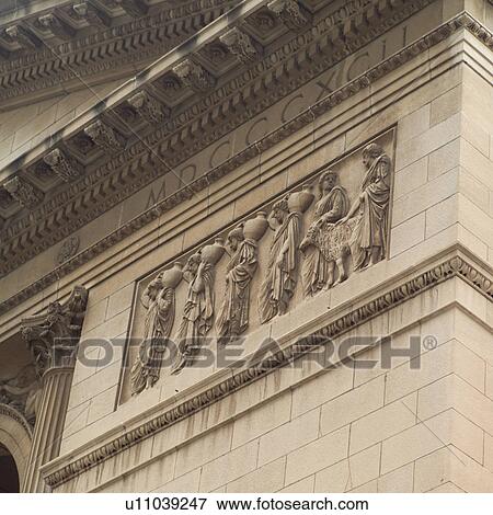 Carvings on a stone wall of a building View Large Photo Image Stock Photo - Carvings on a stone wall of a building. Fotosearch