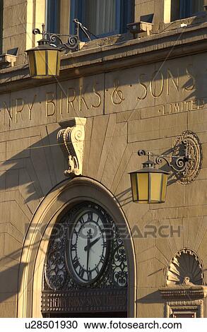 Clock on a building wall View Large Photo Image Stock Image - Clock on a building wall. Fotosearch