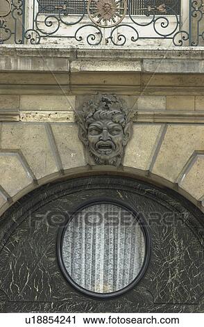 Stone sculpture above an archway View Large Photo Image Stock Image - Stone sculpture above an archway. Fotosearch