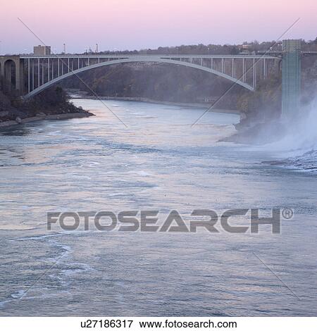 Stock Photo - Bridge over US - Canada Border Niagara Falls - Ontario Canada. Fotosearch