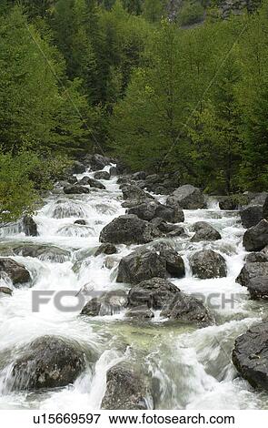 Stock Photo - Cascading waterfall in Slovenia. Fotosearch