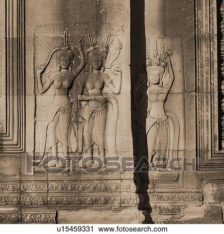 Carved Figurines on Walls of Khmer Kingdom palace ruins View Large Photo Image Stock Image - Carved Figurines on Walls of Khmer Kingdom palace ruins. Fotosearch