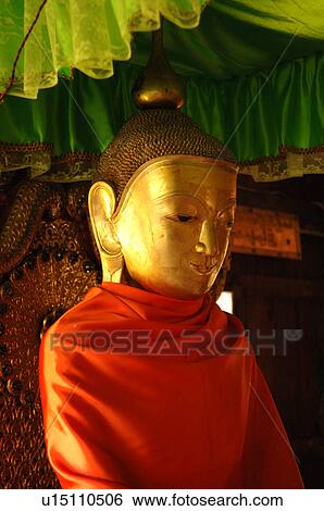 Close up of Buddha wrapped in red View Large Photo Image Stock Photograph - Close up of Buddha wrapped in red. Fotosearch