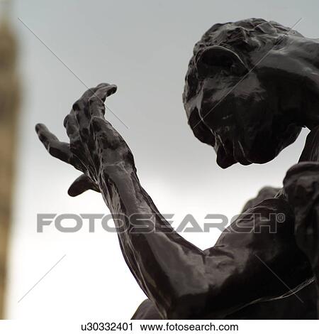 Stone statue of a man outside the house of parliament in London, England View Large Photo Image Stock Image - Stone statue of a man outside the house of parliament in London, England. Fotosearch
