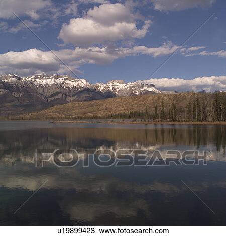 Stock Image - Lake in the Rocky Mountains. Fotosearch