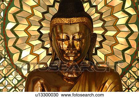 Stock Image - Close up of Buddha statue in Myanmar. Fotosearch