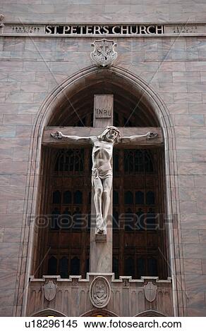 Statue of a cross in an archway View Large Photo Image Stock Photography - Statue of a cross in an archway. Fotosearch