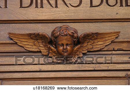 Stone carvings of an angel on a building in Montreal, Canada View Large Photo Image Stock Photo - Stone carvings of an angel on a building in Montreal, Canada. Fotosearch