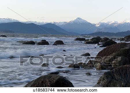 Water crashing into rocks View Large Photo Image Picture - Water crashing into rocks. Fotosearch