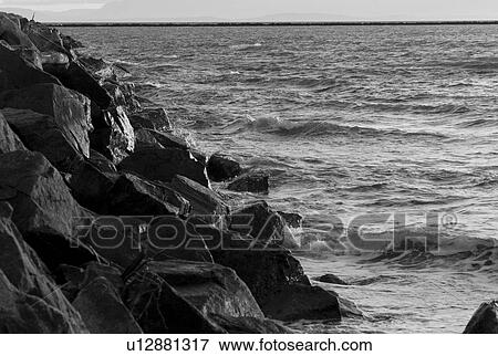 Water crashing into rocks View Large Photo Image Stock Photo - Water crashing into rocks. Fotosearch