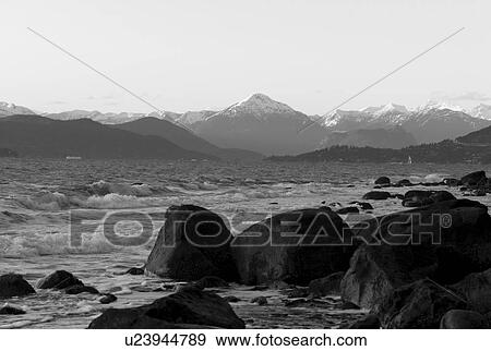Water crashing into rocks View Large Photo Image Stock Photo - Water crashing into rocks. Fotosearch