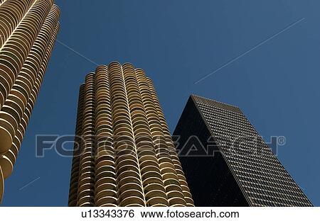 Low angle view of high rise buildings in Chicago View Large Photo Image Stock Photograph - Low angle view of high rise buildings in Chicago. Fotosearch
