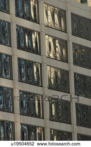 Stock Image - Windows of a high-rise building. Fotosearch