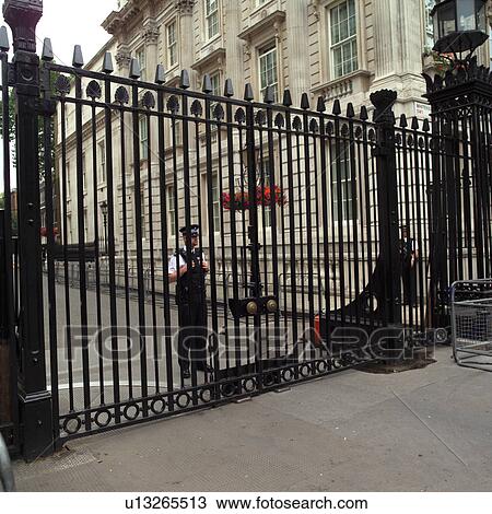 Closed gates of an establishment in London, England View Large Photo Image Stock Image - Closed gates of an establishment in London, England. Fotosearch