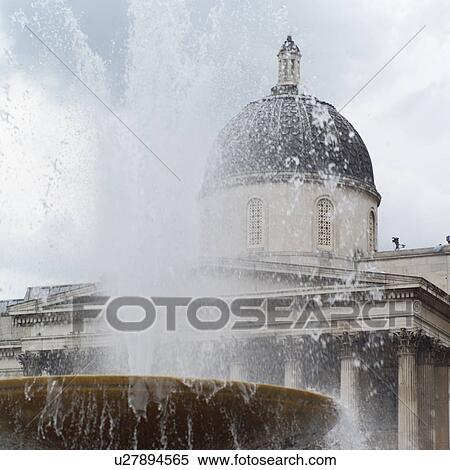 Stock Photography - Fountain in front of the national gallery in London, England. Fotosearch