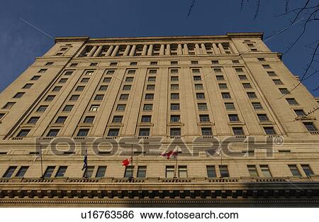 Stock Photograph - Low angle view of an office buildings in Montreal, Canada. Fotosearch