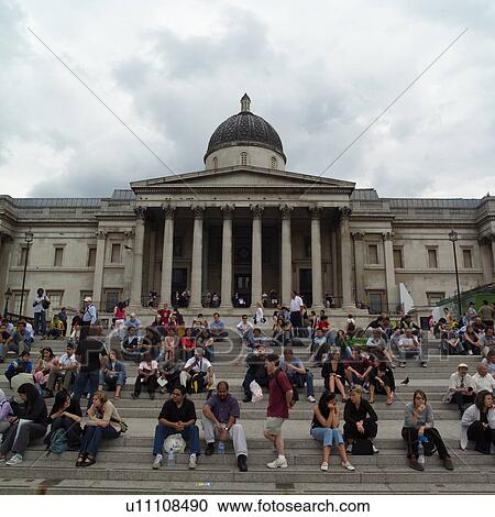 Stock Image - People in front of the national gallery in London, England. Fotosearch