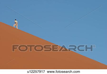 Stock Photo - Sand Dunes of Sossusvlei - Namib desert, Namibia. Fotosearch