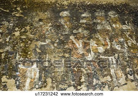 Stock Image - Mural on the wall of a cave, Ajanta, Maharashtra, India. Fotosearch