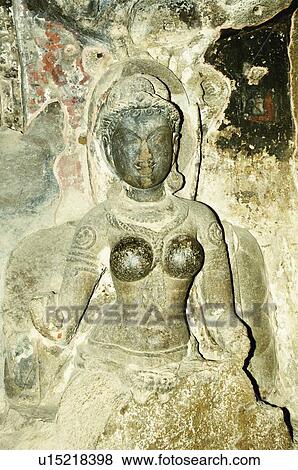 Statue carved in a cave, Ellora, Aurangabad, Maharashtra, India View Large Photo Image Stock Photo - Statue carved in a cave, Ellora, Aurangabad, Maharashtra, India. Fotosearch