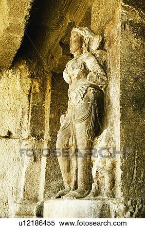 Statue of a goddess carved in a cave, Ellora, Aurangabad, Maharashtra, India View Large Photo Image Stock Photography - Statue of a goddess carved in a cave, Ellora, Aurangabad, Maharashtra, India. Fotosearch