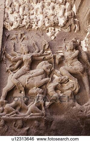 Statue of goddess Durga carved in a cave, Ellora, Aurangabad, Maharashtra, India View Large Photo Image Stock Photograph - Statue of goddess Durga carved in a cave, Ellora, Aurangabad, Maharashtra, India. Fotosearch