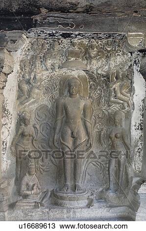 Stock Image - Statues carved in a cave, Ellora, Aurangabad, Maharashtra, India. Fotosearch