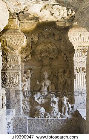 Stock Photo - Statues in a cave, Ellora, Aurangabad, Maharashtra, India. Fotosearch