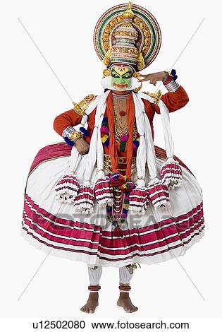 Close-up of a Kathakali dance performer standing View Large Photo Image Stock Image - Close-up of a Kathakali dance performer standing. Fotosearch