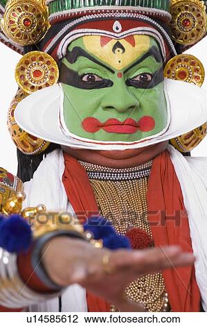Stock Image - Close-up of a Kathakali dance performer. Fotosearch