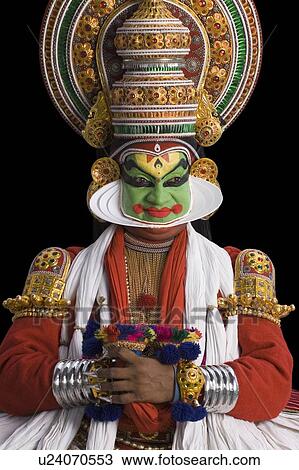 Stock Image - Close-up of a Kathakali dance performer. Fotosearch
