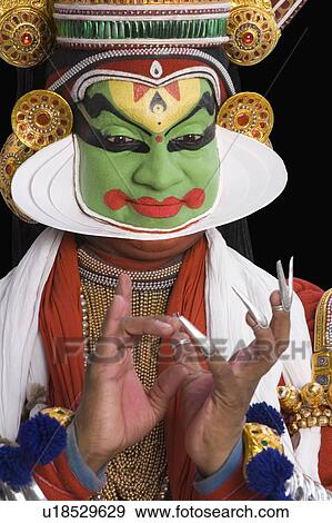 Stock Photo - Close-up of a Kathakali dance performer. Fotosearch