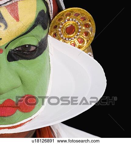 Stock Image - Portrait of a Kathakali dance performer. Fotosearch