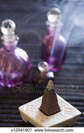Close-up of a burning incense cone View Large Photo Image Stock Photo - Close-up of a burning incense cone. Fotosearch