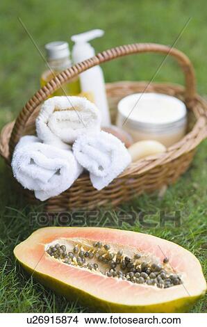Close-up of papaya massage therapy treatment products on the grass View Large Photo Image Picture - Close-up of papaya massage therapy treatment products on the grass. Fotosearch