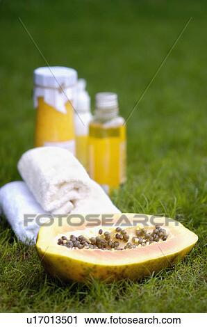 Close-up of papaya massage therapy treatment products on the grass View Large Photo Image Stock Image - Close-up of papaya massage therapy treatment products on the grass. Fotosearch