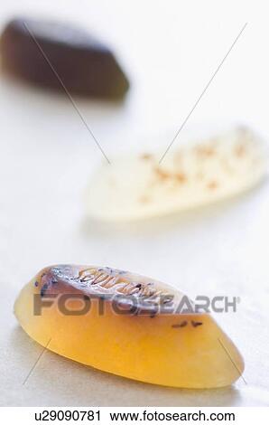 Stock Image - Close-up of soaps in a row. Fotosearch