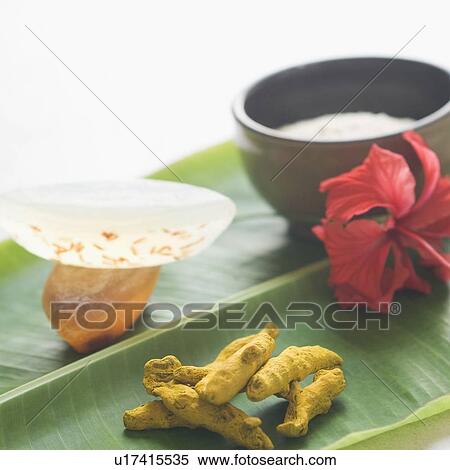 Stock Photography - Close-up of spa treatment products on a banana leaf. Fotosearch
