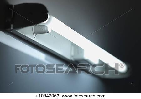 Close-up of a lit fluorescent light View Large Photo Image Stock Photo - Close-up of a lit fluorescent light. Fotosearch