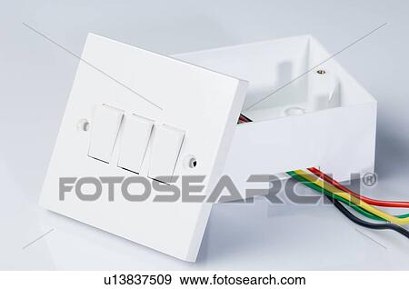 Stock Photo - Close-up of a switchboard with a wire. Fotosearch