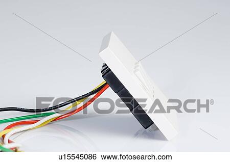 Close-up of a switchboard with a wire View Large Photo Image Stock Photograph - Close-up of a switchboard with a wire. Fotosearch