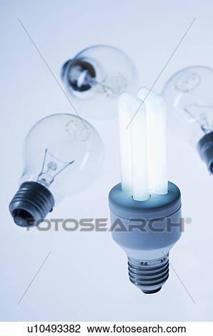 Close-up of light bulbs with a fluorescent light bulb View Large Photo Image Stock Image - Close-up of light bulbs with a fluorescent light bulb. Fotosearch