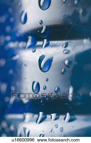 Stock Photograph - Close-up of water drops on a bottle. Fotosearch