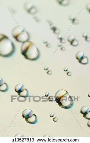 Close-up of water drops on a gray surface View Large Photo Image Stock Image - Close-up of water drops on a gray surface. Fotosearch