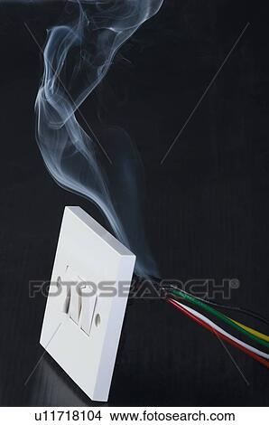 Smoke coming out from a switchboard View Large Photo Image Picture - Smoke coming out from a switchboard. Fotosearch