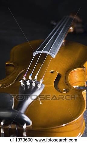 Close-up of a guitar View Large Photo Image Stock Image - Close-up of a guitar. Fotosearch
