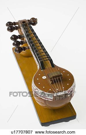 Close-up of a sitar View Large Photo Image Stock Photo - Close-up of a sitar. Fotosearch